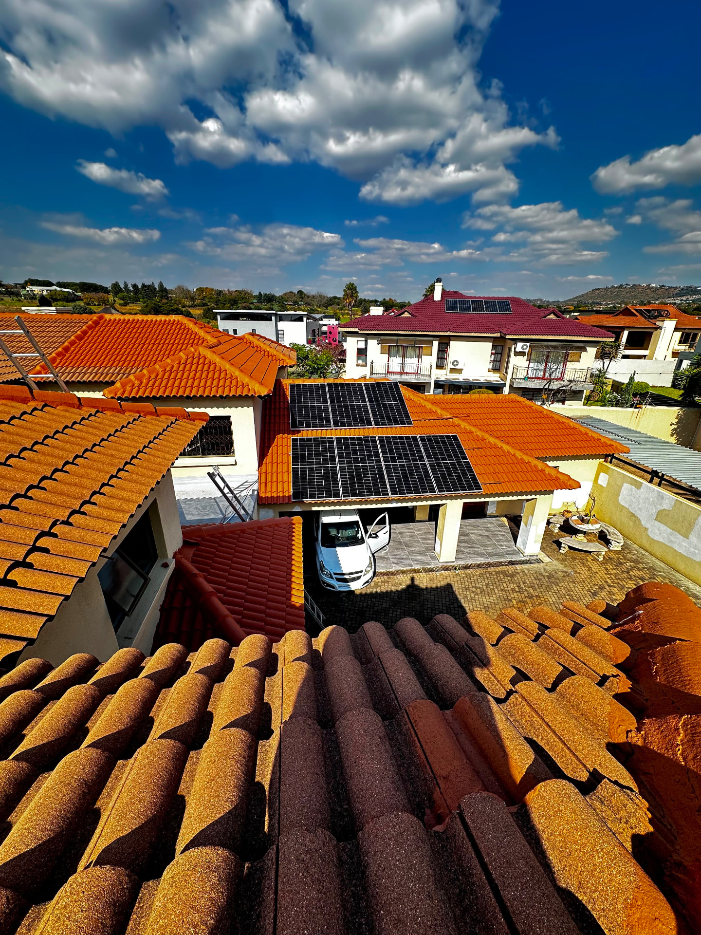 Solar panel array installed on a Johannesburg tiled roof